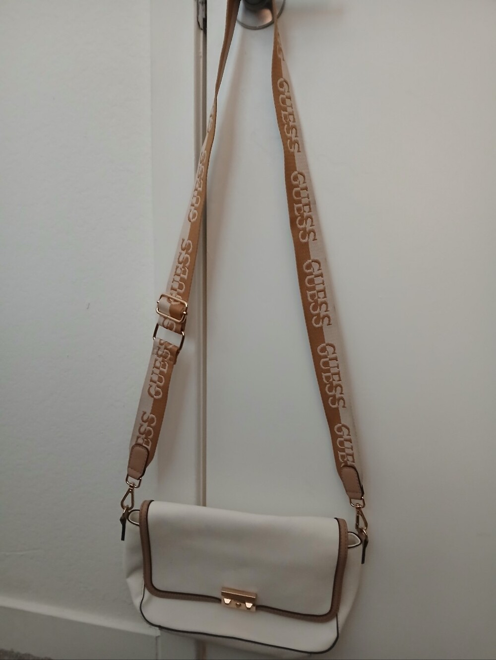 GUESS Cream Crossbody Bag with Tan Trim and Branded Strap